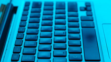 Close up View of Blue Backlit Computer Keyboard Keys