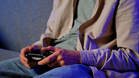 Man Relaxing at Home While Playing Video Games