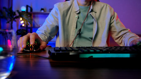Gamer Engaged in an Intense PC Gaming Sessionの写真素材