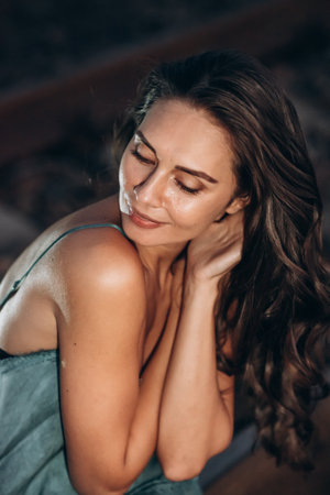 Contemplative Woman with Natural Beauty Portrait Outdoorsの写真素材