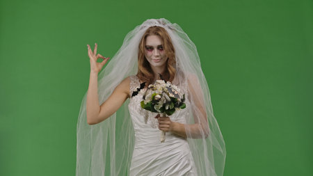 Dead Bride in a Wedding Dress on a Green Background
