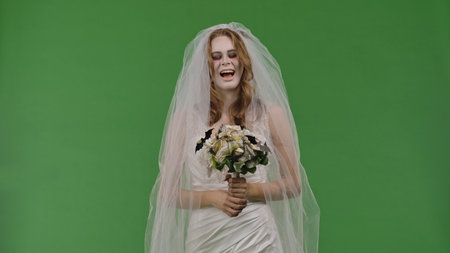 Dead Bride in a Wedding Dress on a Green Background
