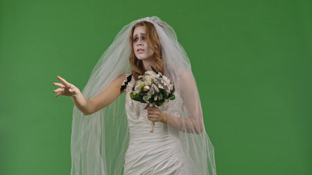 Dead Bride in a Wedding Dress on a Green Background