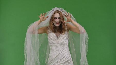 Dead Bride in a Wedding Dress on a Green Background