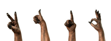 4-in-1 collage of a creepy zombie hand making victory, like, and OK gestures and pointing upwardの写真素材