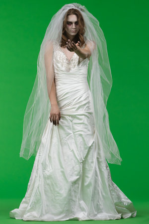 Dead Bride in a Wedding Dress on a Green Background