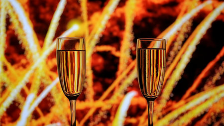 Two glasses of champagne with golden bubbles against a backdrop of warm bokeh fireworks. A festive mood for New Years and Christmas parties.の写真素材