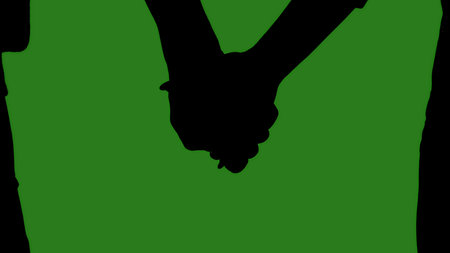 Black silhouettes of a couple holding hands in close up against a green chroma key background. Minimalist contrast and modern visual composition, mockup.の写真素材