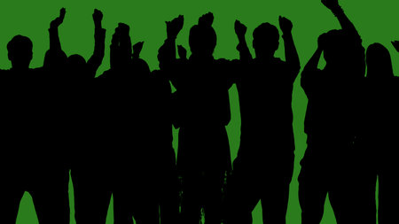 Black silhouettes of a group of people cheerfully celebrate their victory against a green chroma key background. Minimalist contrast and modern visual composition, mockup.の写真素材