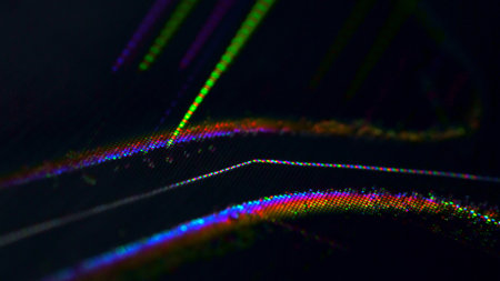 A detailed view of a broken television screen displaying colorful distortion lines and visual artifacts.の写真素材