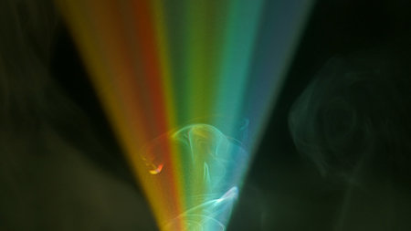 Rays of light, bright of light from projector in fog. A beam of light from a spotlight on stage or in a theater.の写真素材