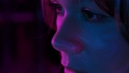 Close up of woman face in neon lights