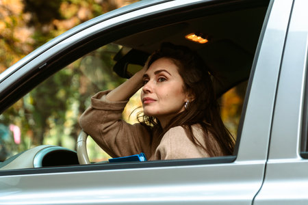 Woman Enjoying Tranquil Moment in Parked Car