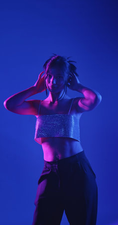 Woman in Sparkly Top with Neon Lighting