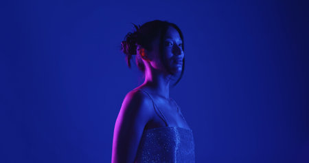 Woman in Sparkly Top with Neon Lighting
