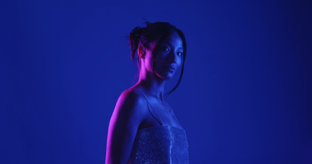 Woman in Sparkly Top with Neon Lighting