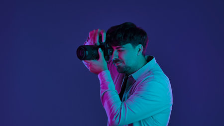 Backstage Photographer in Studio Shooting with Cameraの写真素材