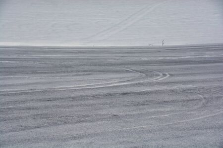 Snow field covered with snow melting agent