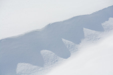 Snow patterns created by the windの写真素材