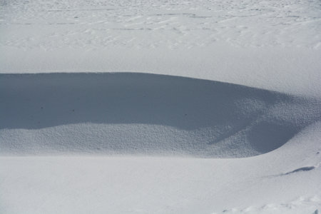 Snow patterns created by the windの写真素材