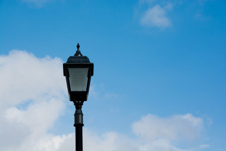 Retro streetlights and blue sky