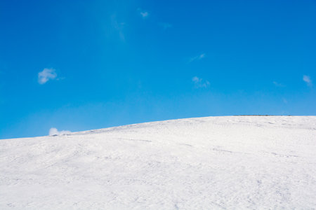 snow field and blue skyの写真素材