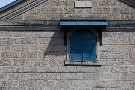 Blue iron door of a block warehouseの写真素材