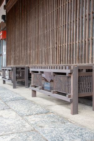 A bench in an old Japanese townの写真素材