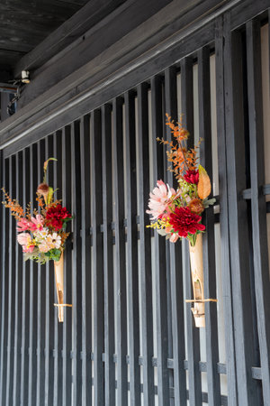 Beautiful bouquet of flowers hanging on the wallの写真素材