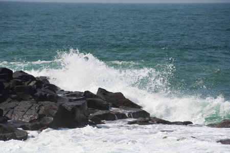Waves breaking on the rocks on the coast