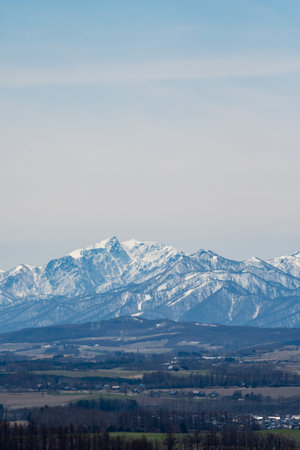 Mountain range covered with snow in the early spring, Hokkaido Japan