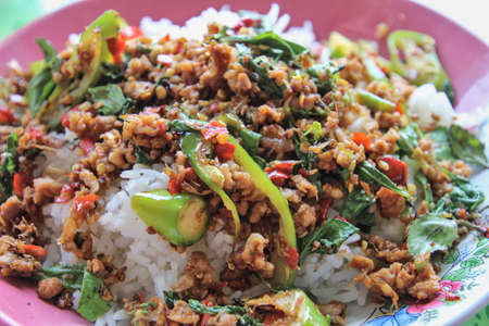 Stir fried minced pork with basil is the food that Thai people like to eat the most.の写真素材