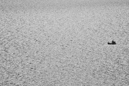 Views of the shadow ship in the sea with black and white images in a minimal concept.の写真素材