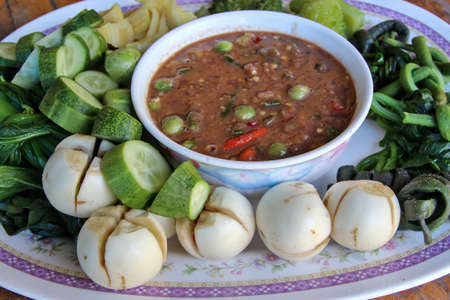 Shrimp Paste Chili Paste, eaten with vegetables. There are fresh vegetables and boiled vegetables, the food that Thais eat oftenの写真素材