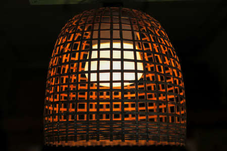 A small chicken coop made from bamboo and coated with turpentine is a great idea to make a lantern.の写真素材