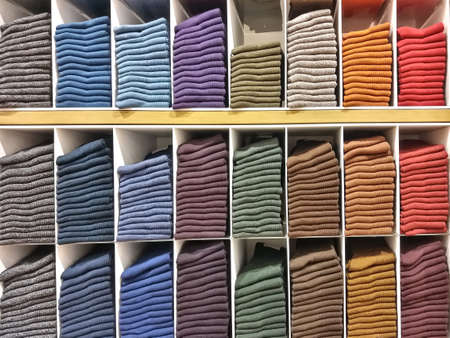 The fabric is folded by the seller. Placed in a showcase to make it easy for customers to buy.の写真素材