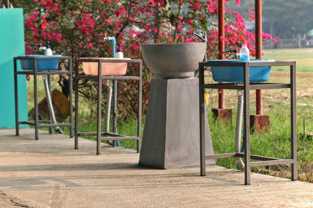 Homemade and handcrafted sinks are made from rebar and cement sinks.の写真素材