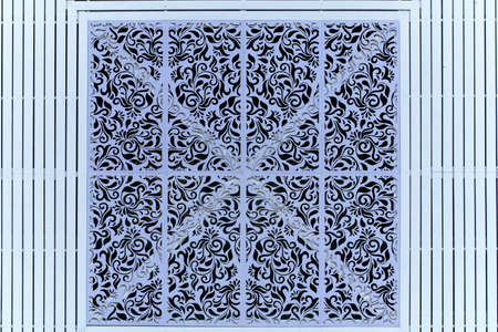 The pattern is formed by the perforation of the air vents. By a skilled craftsman, it has become a perfect wallpaper.の写真素材