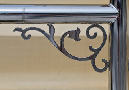 Details of the steel door with various shaped decorative elements with stainless steel.の写真素材