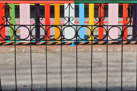 The fence is made of rebar and the fence is made of planks. The concept of comparing different types of objects. but can create the same thingの写真素材