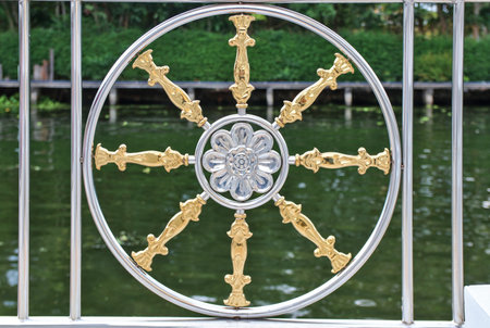 A beautiful decorative element of a metal fence by the river.の写真素材