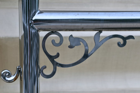 Details of the steel door with various shaped decorative elements with stainless steel.の写真素材
