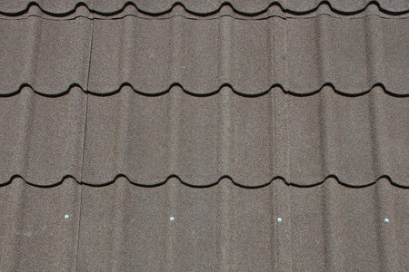 Photo of stone coated and ceramic roof tiles reflects heat well.の写真素材
