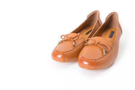 Beautiful vintage Pair of fashion woman leather shoes with side view profile and copy space, isolated on white background.の写真素材