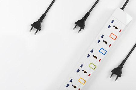 Electrical power strip or extension block and empty outlet tap with switch, grounded top view on...