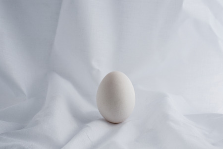 white egg on vintage background.の写真素材
