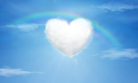 Heart-shaped clouds and rainbowsの写真素材