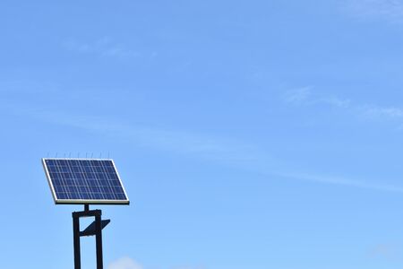 Solar panels and blue sky (left)