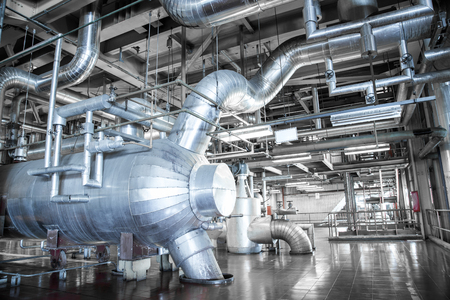 Equipment and piping as found inside of industrial thermal power plantの写真素材