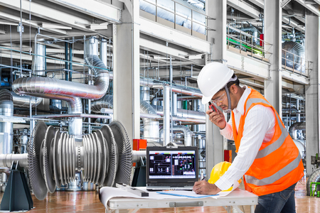 Electrical engineer working at modern thermal power plantの写真素材